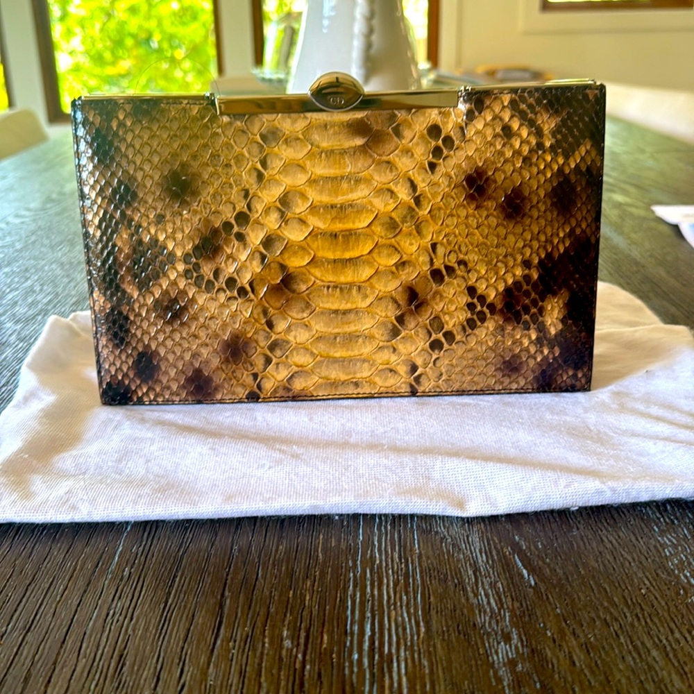 Cristian dior clutch.